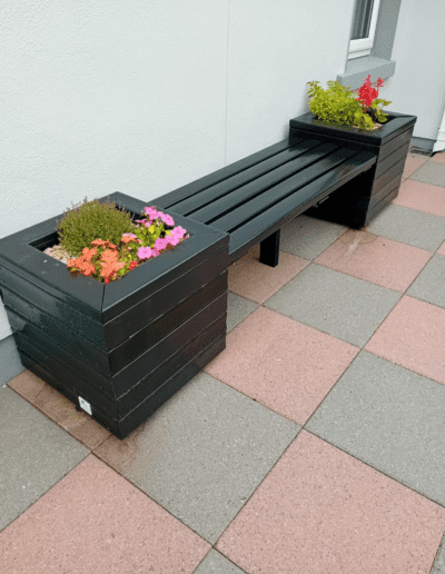 Recycled Plastic Bench Planters Next Generation Plastics NGP with flowers in Irish Summer