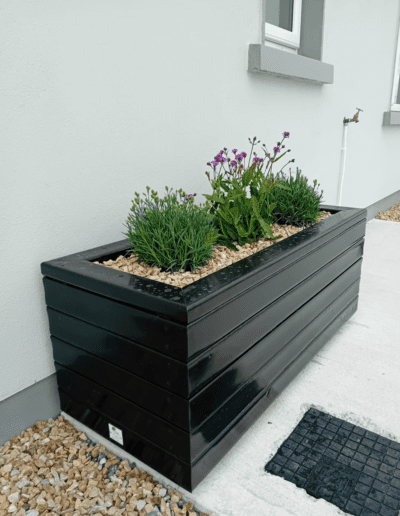 Recycled Plastic Planters Next Generation Plastics NGP with flowers in rectangular style